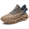 Blade mesh sports shoes in black with low-top design, lace-up closure, and breathable upper