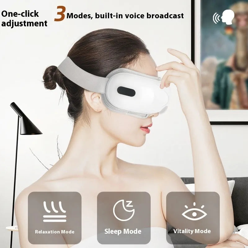 White rechargeable eye massager with hot compress and airbag massage functions