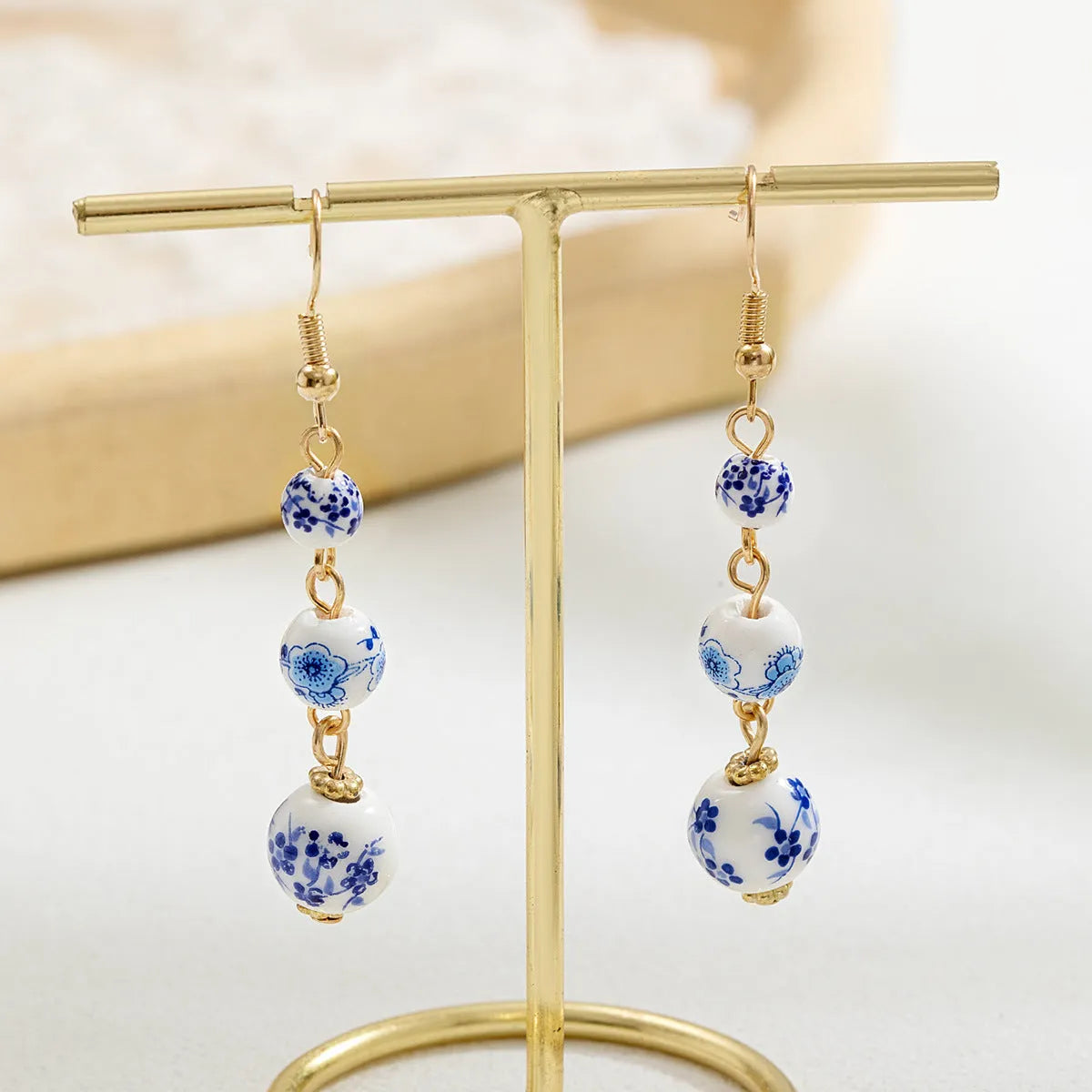 Chinese blue and white porcelain ceramic bead drop earrings with geometric round design