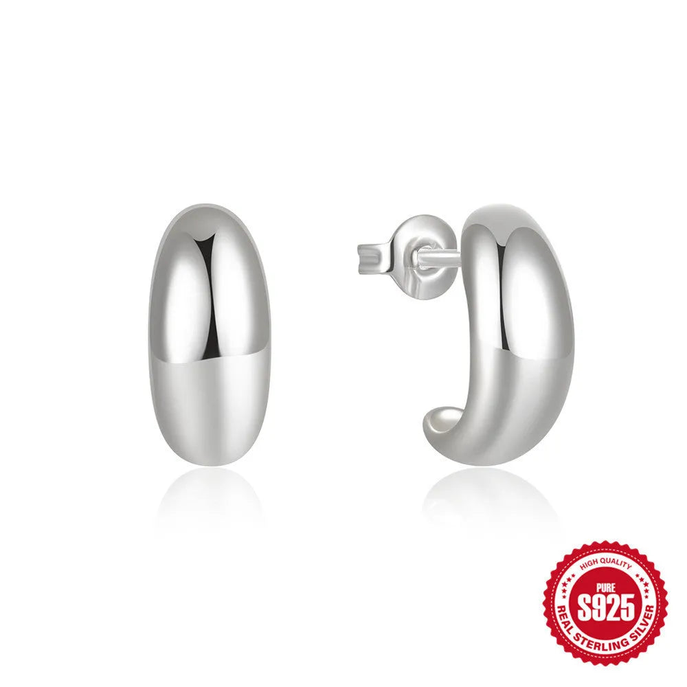 S925 sterling silver C-shaped ringstud earring with glossy electroplated finish in gold or white gold.