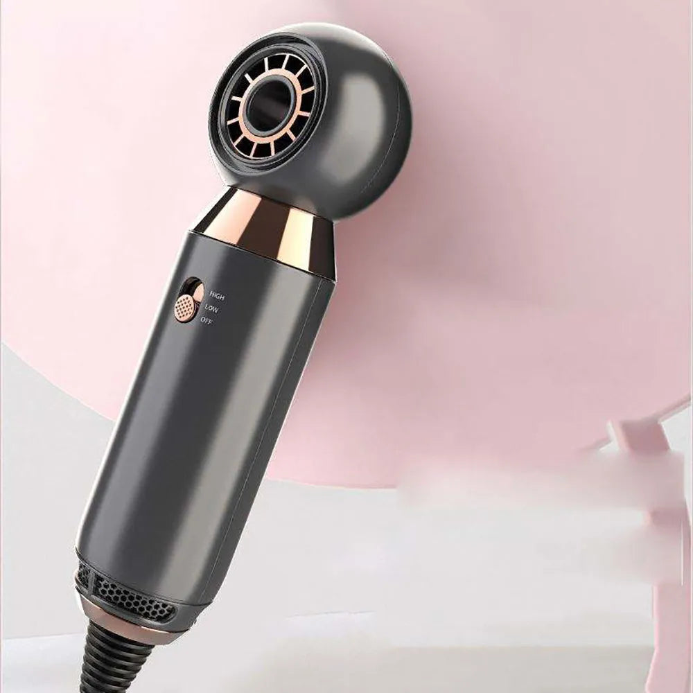 Compact white hair dryer with diffuser attachment, showing length and nozzle detail